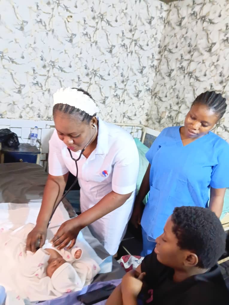 Nurses attending to newborn baby at Mararaba maternity ward